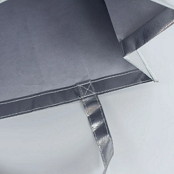 Non-woven silver covered handbag